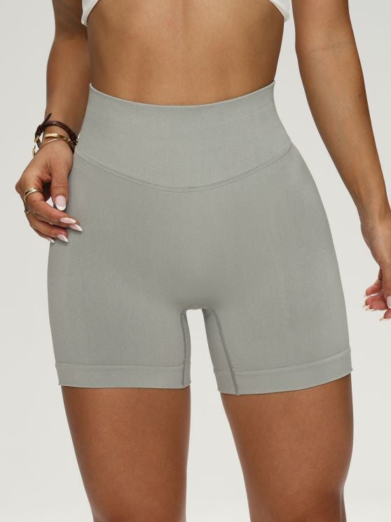 Shorts deportivos mujer de cintura fruncida (push up “peach hip”)